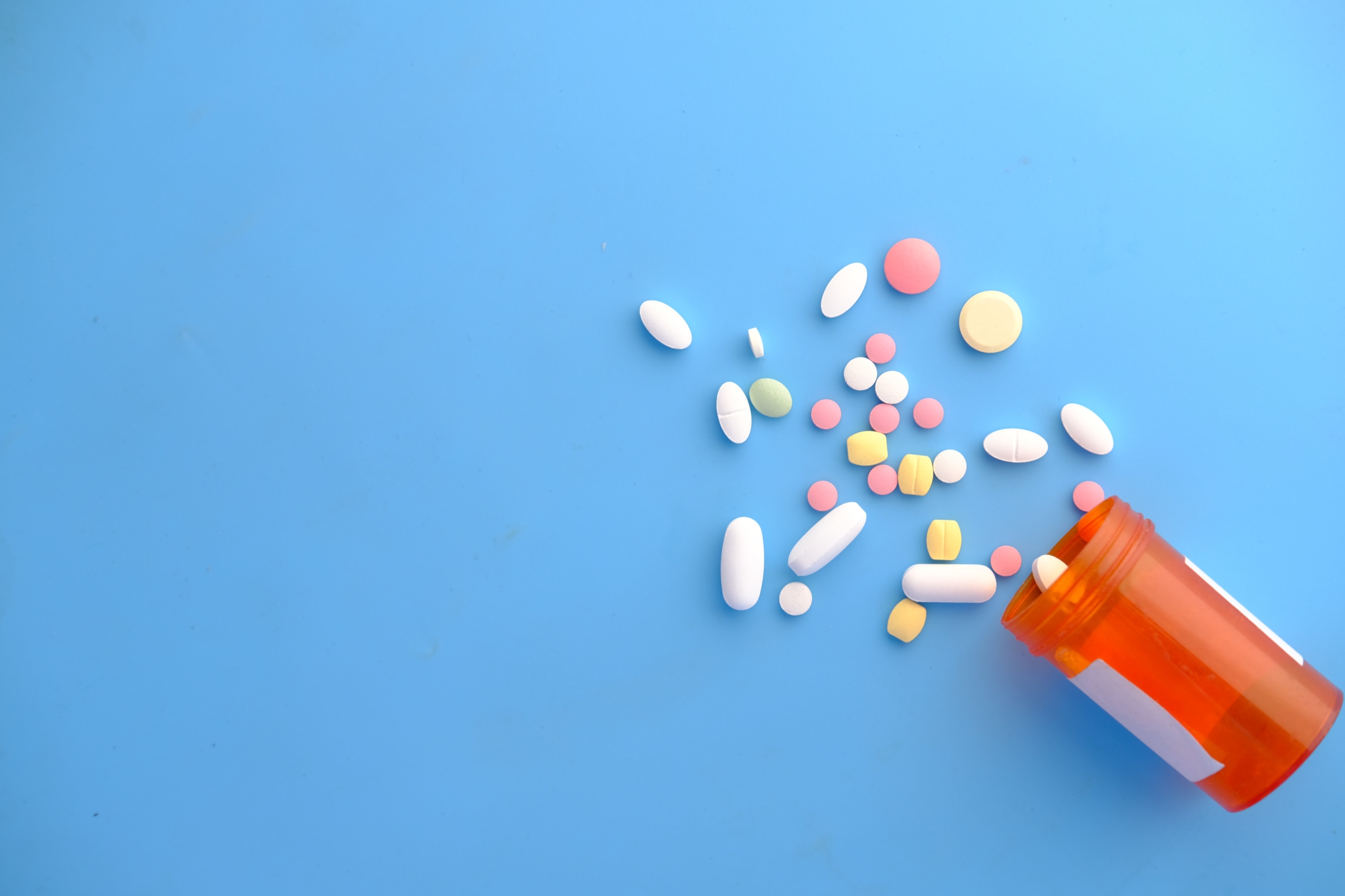 pills on blue background