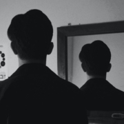 man in front of mirror representing schizoid personality